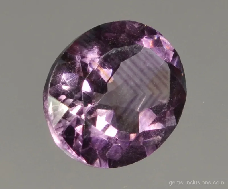 color zoning in heated quartz