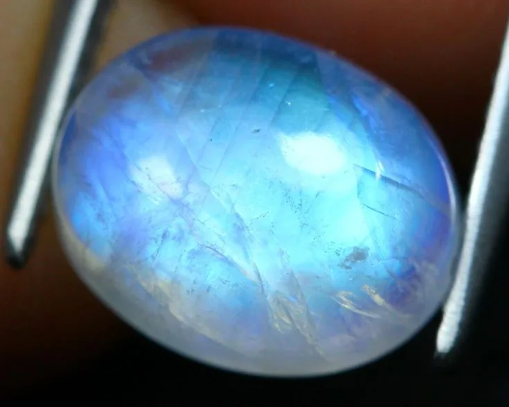 fake moonstone vs real rainbow moonstone adularescence flash