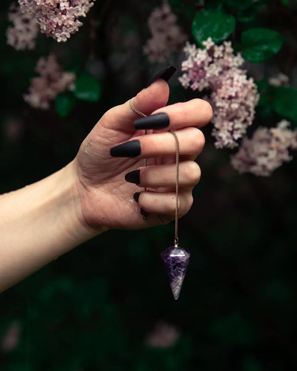 how to cleanse crystal pendulum between divination questions