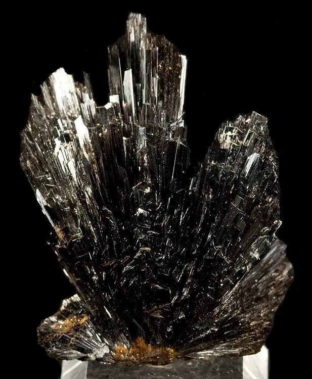 Iron Oxide Inclusions (Goethite/Limonite within the stone)