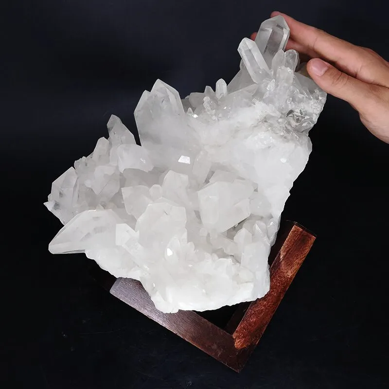 Harmonizing clear quartz and selenite crystal wands used to neutralize clashing gemstone energies
